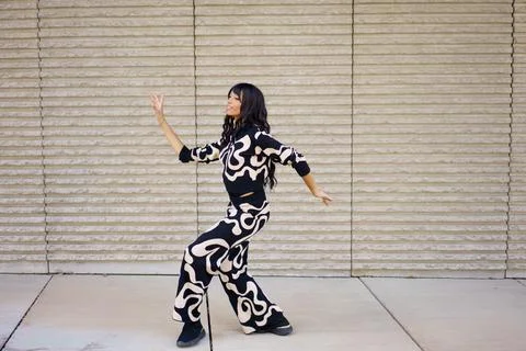 Expressive dancer performing modern movements dancing in the city Stock Photos