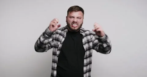 Expressive emotions captured in a creative outdoor performance with a joyfu.. Stockbeeldmateriaal 329110504