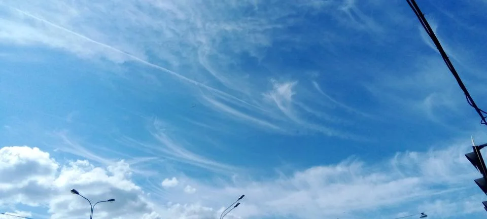 Expressive feather clouds Stock Photos