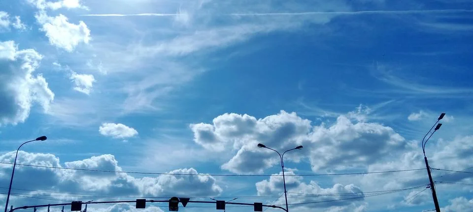 Expressive feather clouds Stock Photos