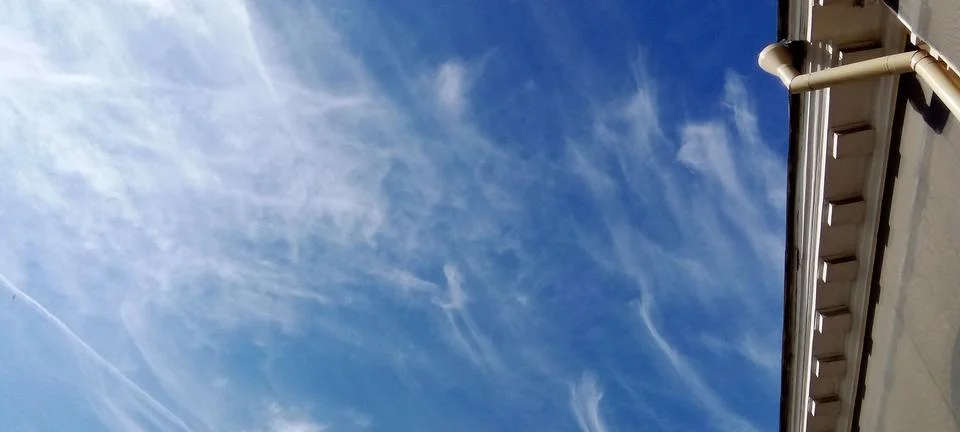 Expressive feather clouds Stock Photos