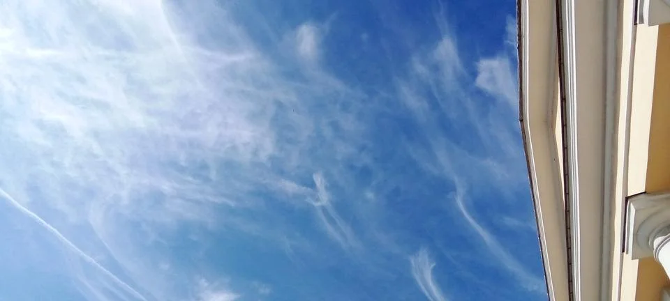 Expressive feather clouds Stock Photos