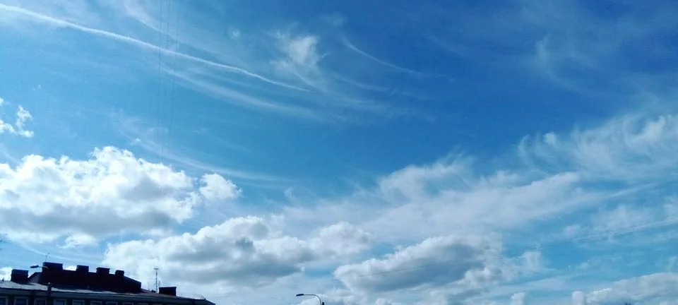 Expressive feather clouds Stock Photos