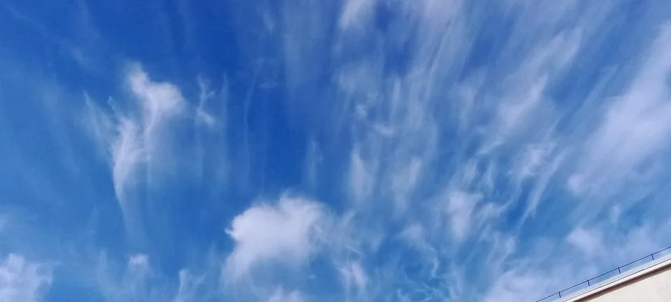 Expressive feather clouds Stock Photos