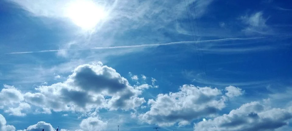 Expressive feather clouds Stock Photos