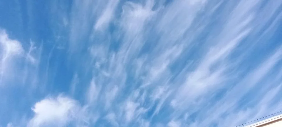 Expressive feather clouds Stock Photos