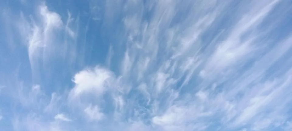 Expressive feather clouds Stock Photos