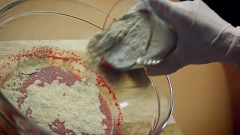 Expressive immersion blender smoothing roasted beetroot in overhead, 4K Stock Footage 341111591