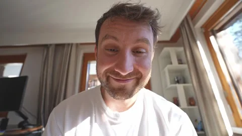 Expressive man making funny faces at home Stock-Footage 328290553
