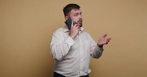 Expressive phone conversations showcase emotions and gestures in a vibrant .. Stock-Footage 329110280