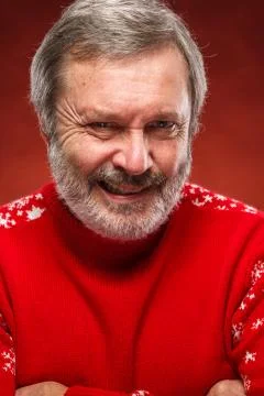 The expressive portrait on red background of a pouter man Stock Photos