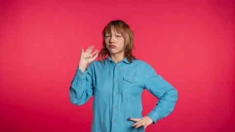 Expressive woman making funny faces and dancing Stock Footage 328051853