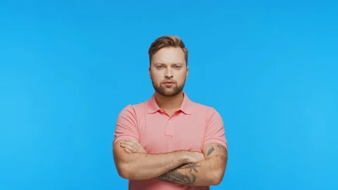 Expressive young man over vibrant background. Studio portrait of handsome person Stock Footage 123545866