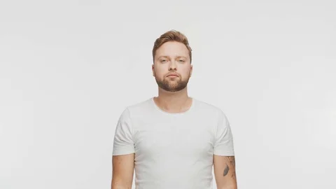 Expressive young man over vibrant background. Studio portrait of handsome person Stock Footage 123546044
