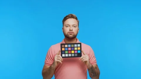 Expressive young man over vibrant background. Studio portrait of handsome person Stock Footage 123712973