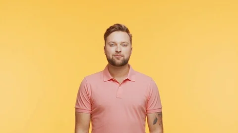 Expressive young man over vibrant background. Studio portrait of handsome person Stock Footage 123859044