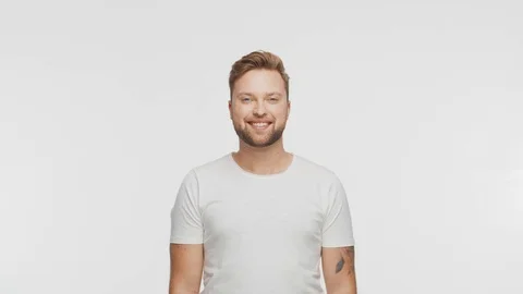 Expressive young man over vibrant background. Studio portrait of handsome person Video stock 123995269