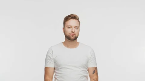 Expressive young man over vibrant background. Studio portrait of handsome person Stock Footage 125066310