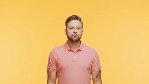 Expressive young man over vibrant background. Portrait of handsome person. Stock Footage 125170626