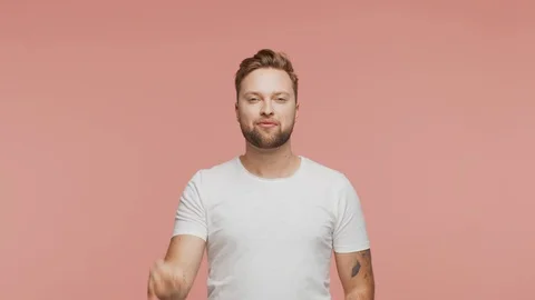 Expressive young man over vibrant background. Studio portrait of handsome person Stock Footage 126244050