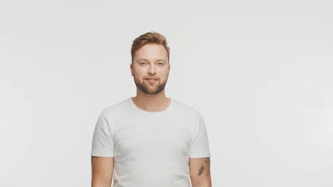 Expressive young man over vibrant background. Studio portrait of handsome person Stock Footage 126244152