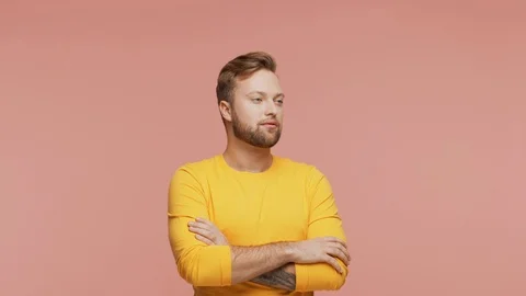 Expressive young man over vibrant background. Studio portrait of handsome person Stock Footage 126568181