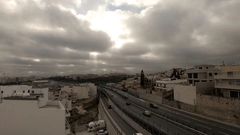 Expressway into cities under fast clouds 库存影片 127513878