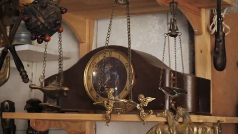 This exquisite Antique Clock features a beautiful Decorative Pendulum Stock Footage 282538892