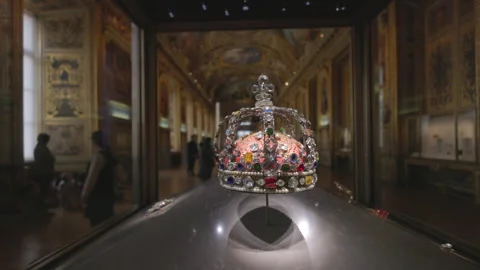 An Exquisite Crown, Gracefully Displayed, Captivates Visitors in a Museum Stock Footage 295748558