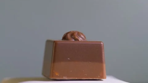 Exquisite delicious handmade chocolates isolated, rotation. sweet dessert Stock Footage 150365737
