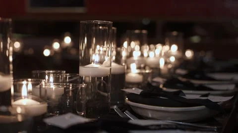 Exquisite Festive Dining Arrangement Enhanced By Candlelight And Lavish Stock Footage 323776880