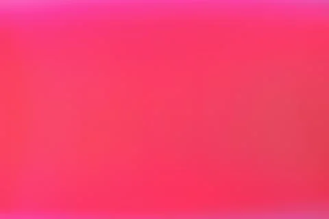 An exquisite gradient transitioning from vibrant pink to a luminous coral b.. Stock Photos