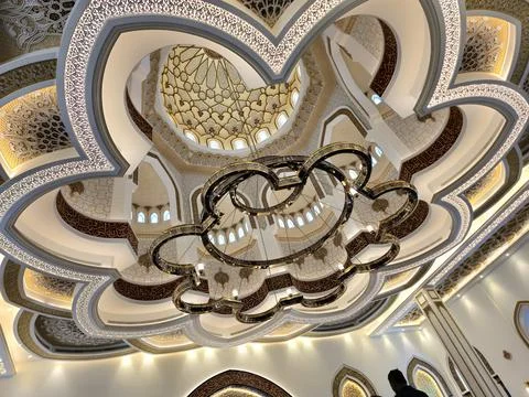 An exquisite low-angle shot captures a mosque's ornate ceiling Stock Photos