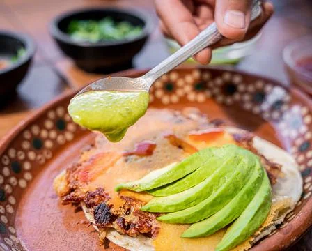 Exquisite Mexican style solid beef with golden cheese. Stock Photos