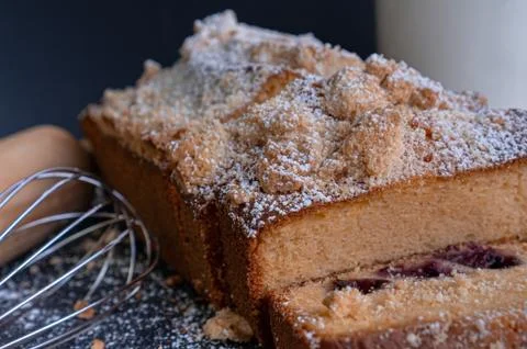 Exquisite red fruit bread, cream cheese, orange and almonds dusted with sugar Stock Photos
