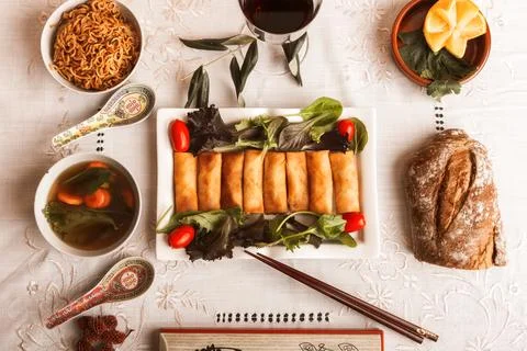 Exquisite spring roll platter setup with accompaniments Stock Photos