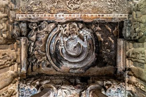 Exquisite stone carved artifacts on ceiling of goddess Durga temple in Aihole Stock Photos