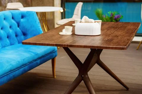 An exquisite table in a cafe with the consequences of drinking a cup of coffe Stock Photos