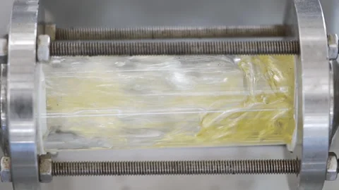 Ext Close up Sample tube Boiled Oil Industrial Fryer Slowmotion 100fps Stock-Footage 248042893