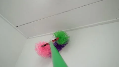 Extendable ceiling and wall duster Stock Footage 150195837