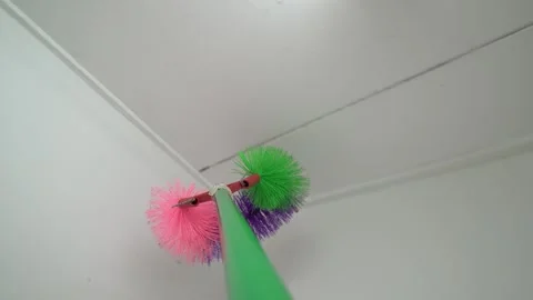Extendable ceiling and wall duster Stock Footage 321389294