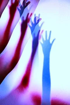 Extended arm with shadow 스톡 사진