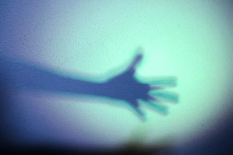 Extended arm with shadow Stock Photos