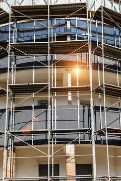 Extensive scaffolding providing platforms for work in progress on a new apart Stock Photos