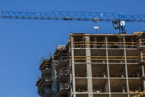 Extensive scaffolding providing platforms for work in progress on a new apart Stock Photos