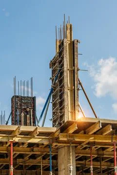 Extensive scaffolding providing platforms for work in progress on a new apart Stock Photos