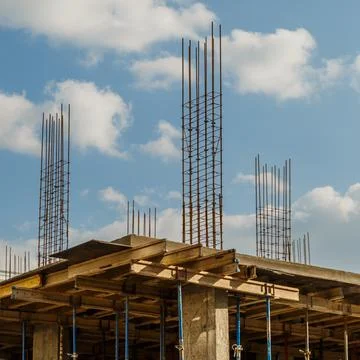 Extensive scaffolding providing platforms for work in progress on a new apart Stock Photos