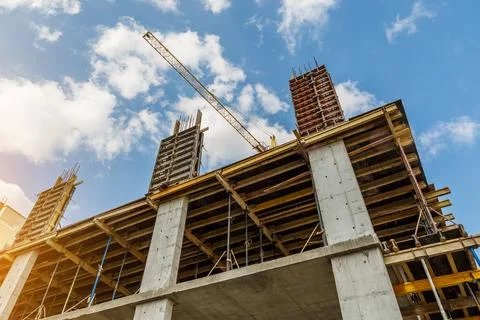 Extensive scaffolding providing platforms for work in progress on a new apart Stock Photos