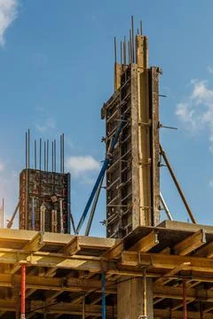 Extensive scaffolding providing platforms for work in progress on a new apart Stock Photos