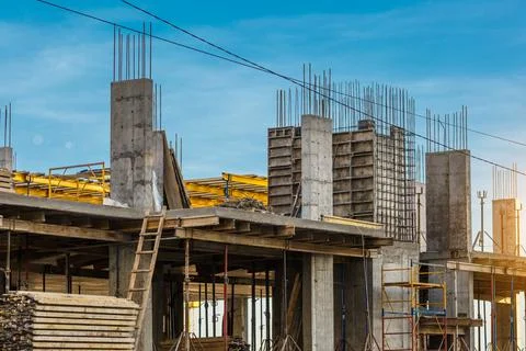 Extensive scaffolding providing platforms for work in progress on a new apart Stock Photos